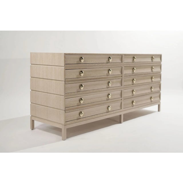 Inspired by the iconic designer Paul Frankl, this rustic modern bedside table blends timeless elegance with contemporary...