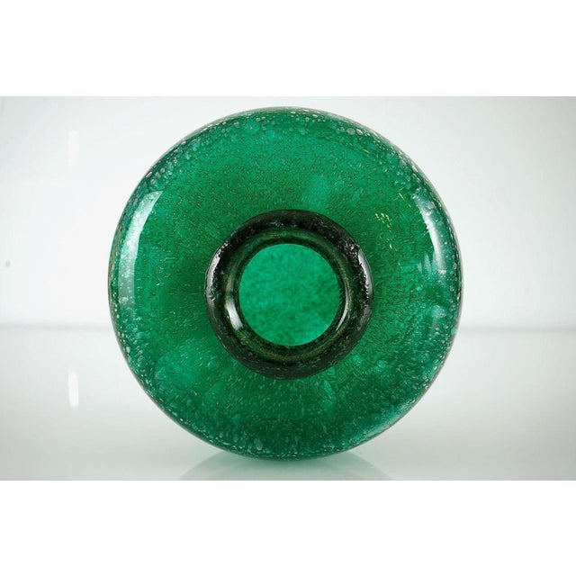 This rare, single vase was designed by Livio Seguso for Bisazza during the early 1990s. It is executed in a deep emerald...