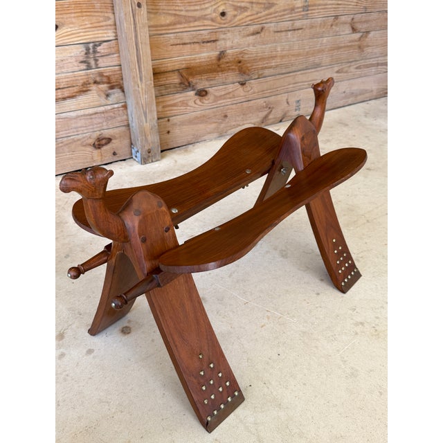 Vintage Carved Boho Camel Saddle Stool or Ottoman With Brass Studded Legs For Sale - Image 9 of 12