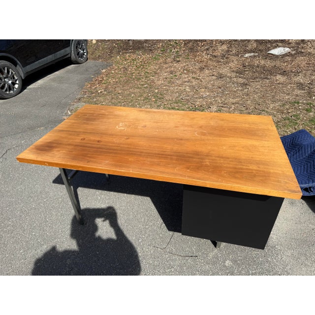 This is a vintage Herman Nelson for Herman Miller MCM Walnut Executive desk. A beautiful and commanding piece of...