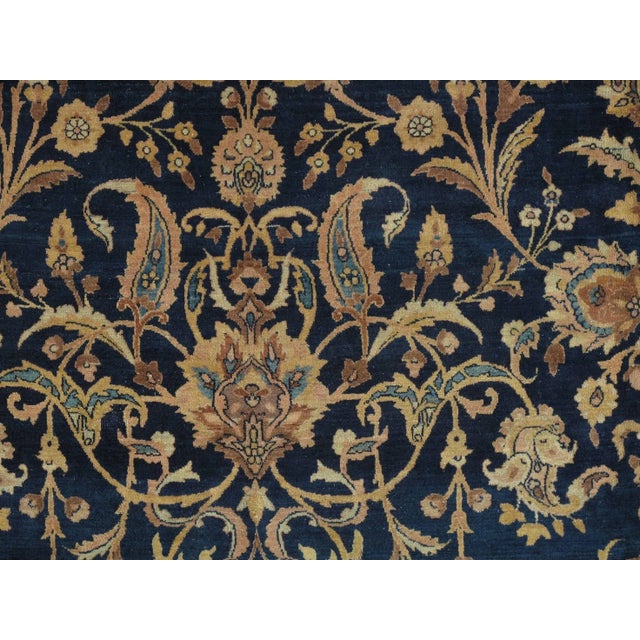 This master crafted Persian Kerman carpet exemplifies the profound understanding of the artistic principles of balance and...
