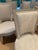 A set of ten Louis XVI style painted side chairs, each with a tapered rectangular upholstered back above a tight...