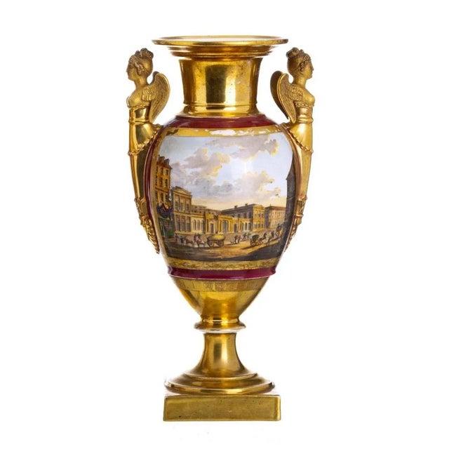 Pair of empire vases "Views of Versailles" French, in porcelain from the 19th century. 19th century polychrome and gilded...