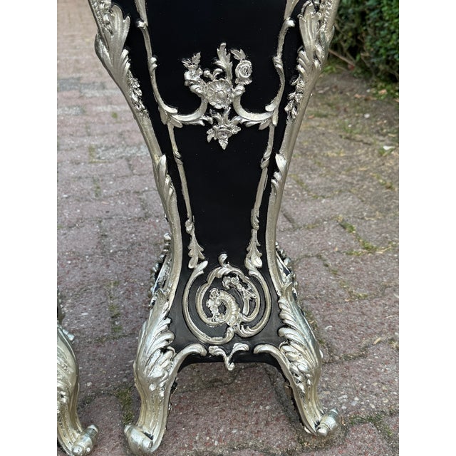 This striking circa 1980 Italian Baroque Revival pedestal combines dramatic sculptural ornamentation with a sophisticated...