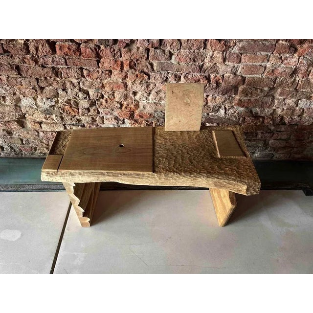 Bench by Pietro Meccani for Meccani Arredamenti, 1995. Handmade bench with carved parts. In oak and ash root. Single...