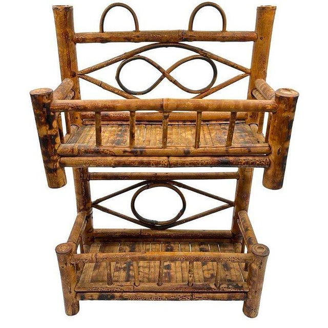 Original Aesthetic Movement Victorian Tiger Bamboo Rattan Two-Tier Shelf, perfect for both display and storage. The shelf...