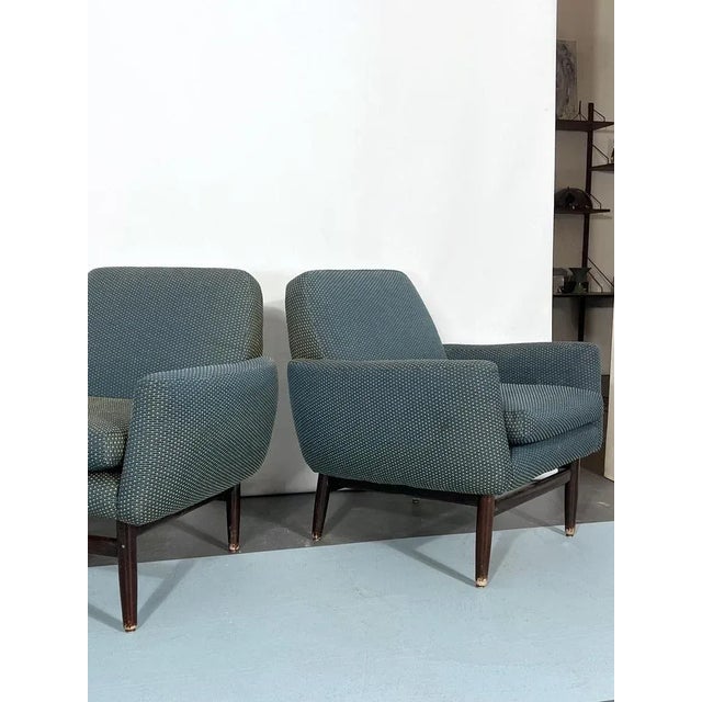 Very good vintage condition for this set of two Italian armchairs manufactured in Italy during the 60s and made from...