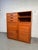 Distinctive mid-century Danish cabinet crafted in solid teak, featuring a bold square-lined facade with strongly defined...