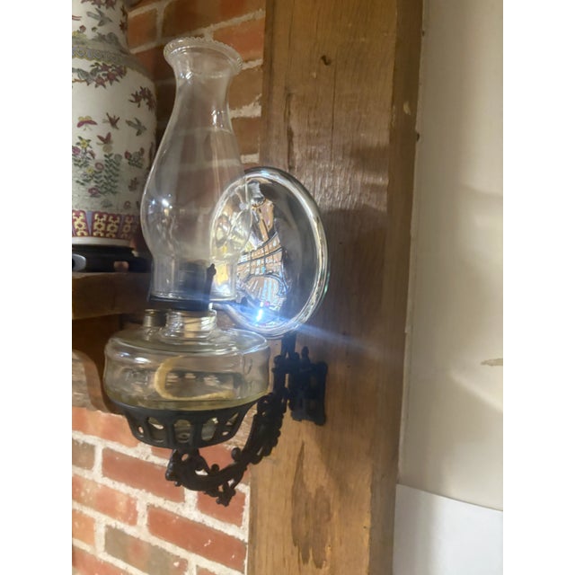 Antique Cast Iron Wall Mount Queen Anne OIL Lamp With Mercury Reflector. This ornate wall lamp is in excellent condition...
