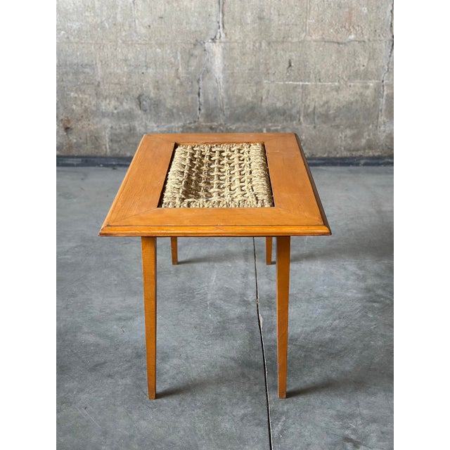 Rare oak and rope side table by Adrien Audoux and Frida Minet. Great texture from the combination of the rough rope center...