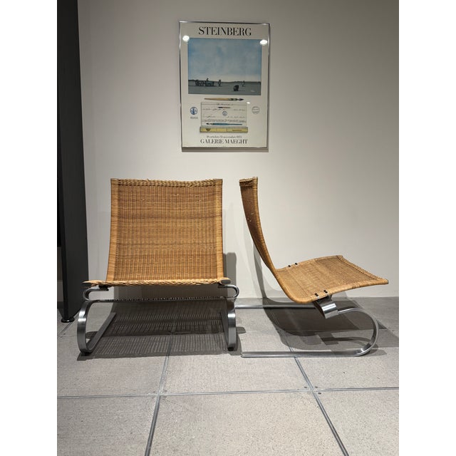 Pre Owned Fritz Hansen PK20 wicker lounge chair designed by Poul Kjærholm. Minimalist Low lounge chair with Stainless...