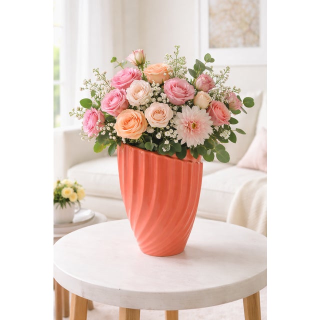This beautiful orange/coral, 13" high, vase can be the highlight of your table top or a standout on your MCM buffet. The...