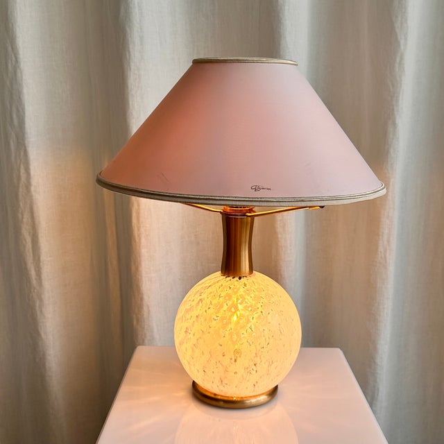 Very rare and unique Murano glass table lamp by La Murrina. Beautiful glass works on the globular body of the lamp in the...