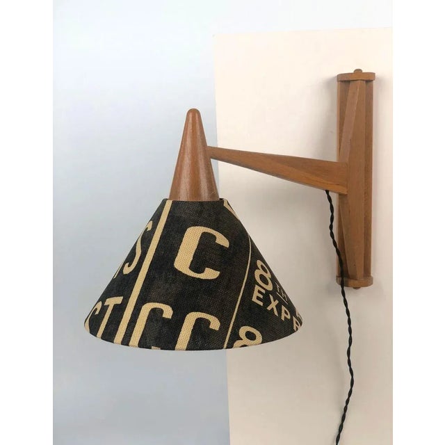 A lovely example of a midcentury wall lamp from the 1950s. A simple, functional design. Used as reading lamp, it can be...