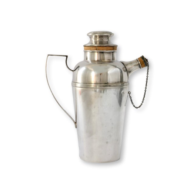 Oversized engraved silver-plated cocktail shaker gifted in 1936 from Peter and Bill to Bill and Tommy. Whether it was a...