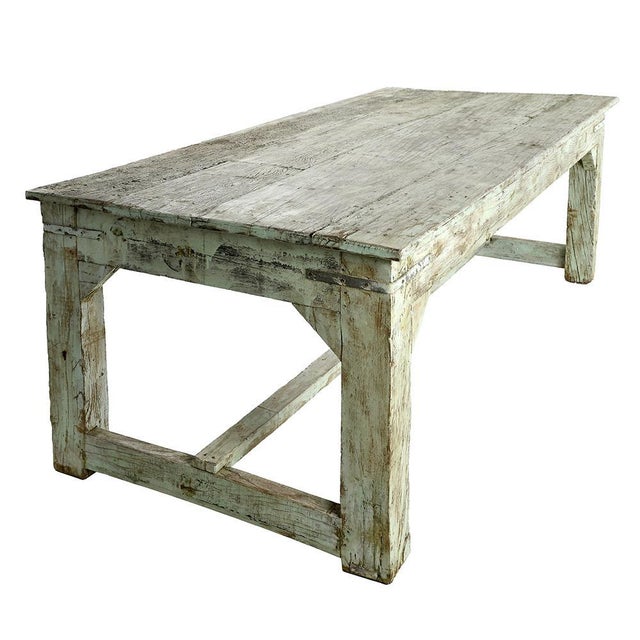 This solid wood table, imposing with its dimensions of 89 cm high, 236 cm wide and 113 cm deep, is a centerpiece that will...