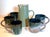 A modernist drink set of with glazed ceramic 5 cups and pitcher, made by noted Hungarian-born studio potter Eugene Deutch...