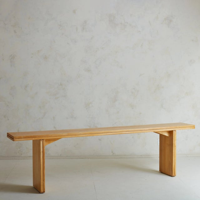 ‘La Barca’ extendable dining table designed by Piero De Martini in 1975 for Cassina featuring a beautiful honey hued oak....