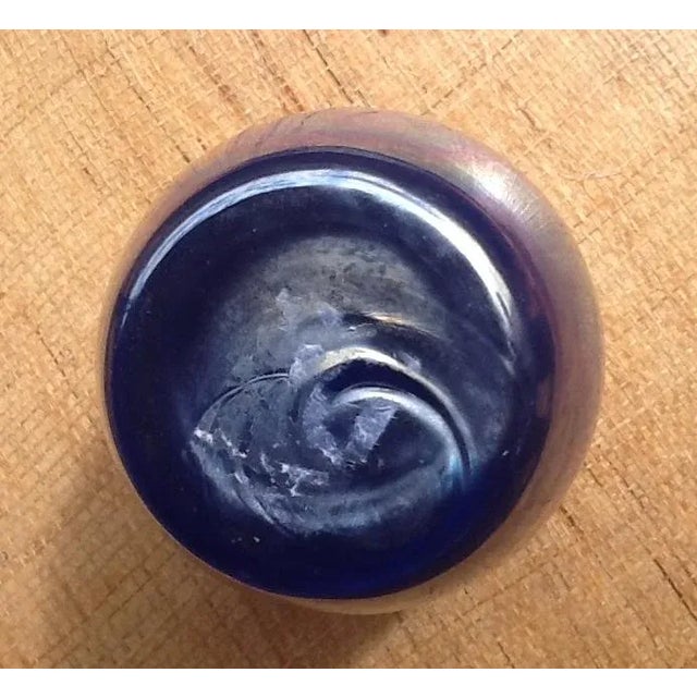 Made in Mexico in the 1980's, this oval vintage Art Glass Vase is an absolute showstopper! It showcases an iridescent blue...