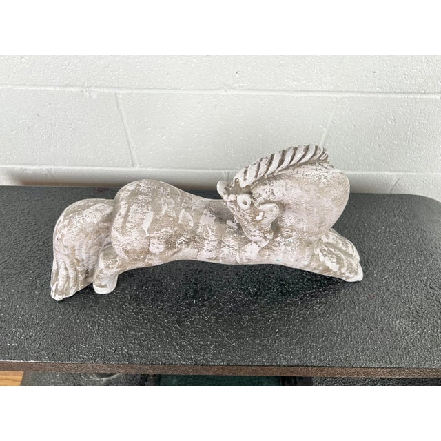Rare large horse signed "Made in France", circa 1940. Elegant stylized stoneware enhanced with dripping white enamel. Very...