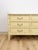 This lovely vintage Henry Link Bali Hai 6-drawer dresser in cream is a beautiful and highly collectible Hollywood Regency...