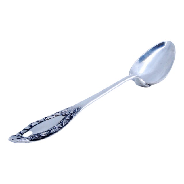 Silver Rice and Serving Spoon with Reliefs and Medallion Handle For Sale