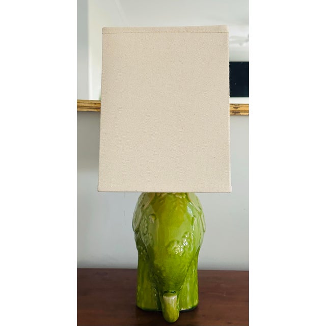 I couldn't resist this little elephant lamp with daisies. Perfect for a child's room. One of the new printed fabric shades...