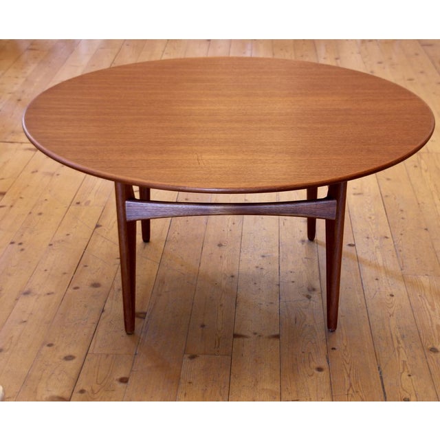 Teak side or coffee table. Design by karl-erik ekselius for joc - j.o. Carlsson, sweden. the table top is screwed onto the...