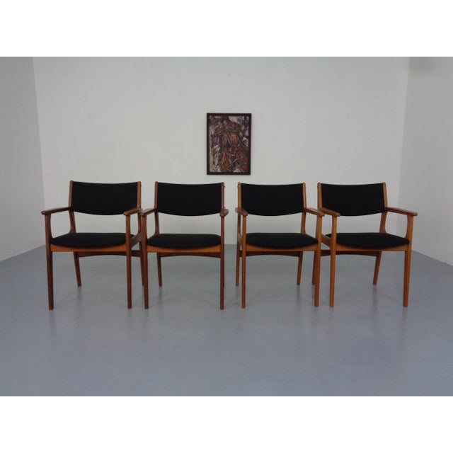 Set of 4 teak armchairs by Erik Buch from the 1960s. Reupholstered in black fabric. I have official proof of authenticity...