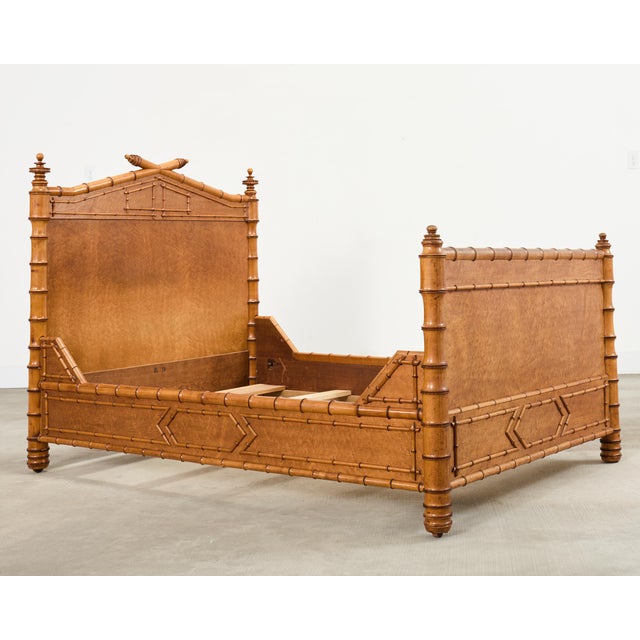 Gorgeous late 19th century English aesthetic movement bed beautifully crafted from fruitwood and decorated with birds eye...