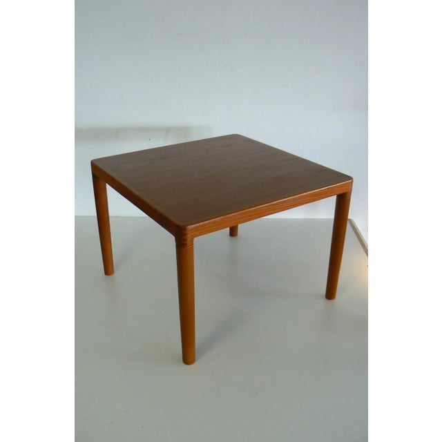 This square coffee table, no. 282, from the 1970s was designed by Henry W. Klein for Bramin, Denmark. Labeled with Country...