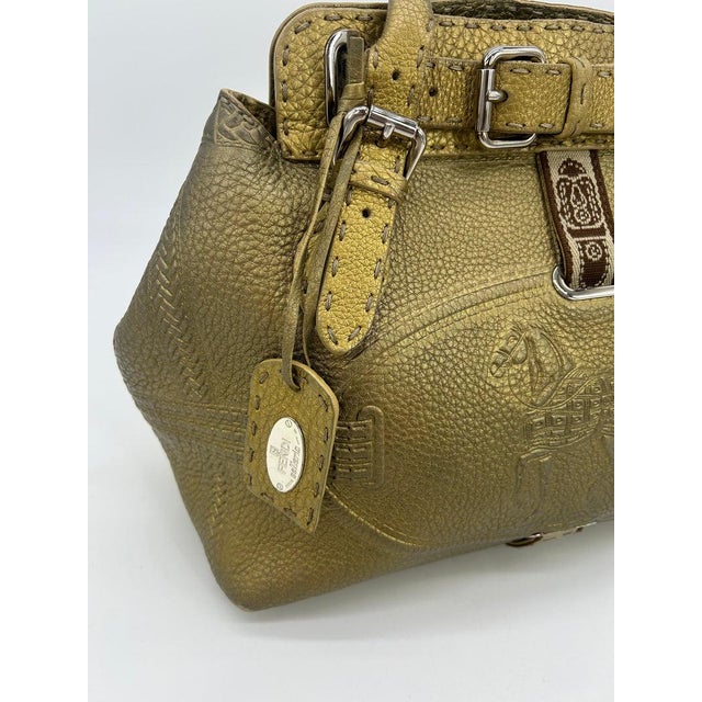 Fendi Selleria Villa Borghese Gold Leather Tote In good condition. Gold leather exterior with embossed horse design on...