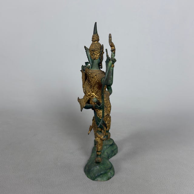 An exceptional masterpiece of oriental sculpture that crystallizes in bronze the eternal epic struggle between good and...