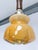 Unique Italian Murano glass pendant lamp in the style of Mazzega, dating from the 1960s. The glass shade, featuring warm...