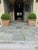 A large Tuscan style embossed terracotta planter having decorative festoons, swags and cherub faces. Two are available but...