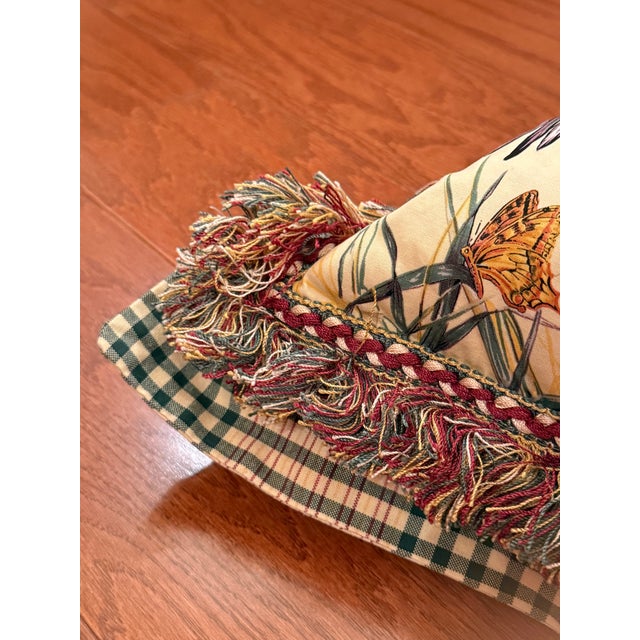 A custom made Decorator unique decorative piece for any living room. Embellished with coordinating tassel fringe trim...