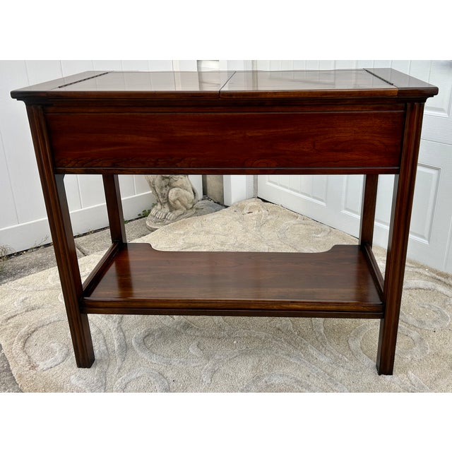 Vintage (1980's) Flip Top Server/Bar Table has a Chippendale Style. Made by Harden Furniture. The Wood is Cherrywood. Red...