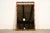 A gorgeous mid-century modern Hollywood Regency Chinoiserie sculpted walnut faux bamboo wall mirror By Thomasville USA,...