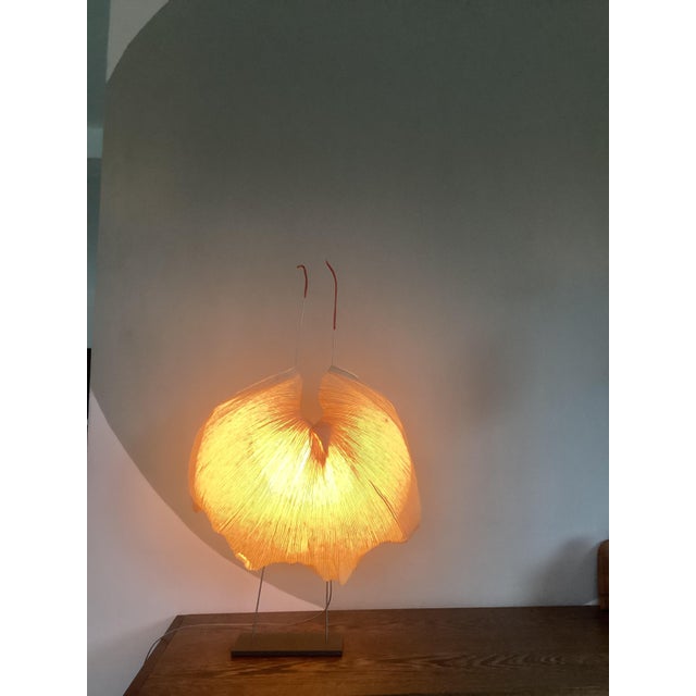 Poul Poul Table Lamp by Ingo Maurer, 1980, in Good conditions. Designed 1980 to 1989 This piece is attributed to the...