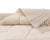 Two quiet patterns, one serene field: diamonds and lines meeting in soft ivory. A soft ivory field covers the rug,...