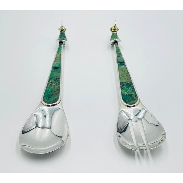 An exceptional and sculptural pair of serving utensils designed by Emilia Castillo for the renowned Los Castillo workshop,...