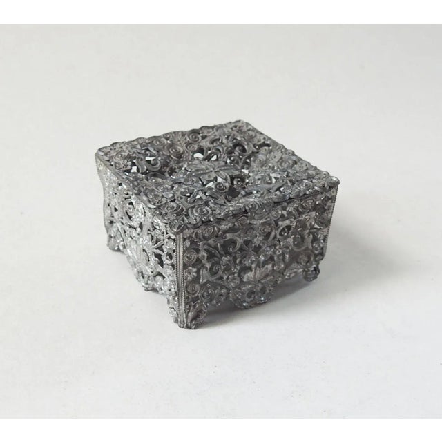 Small antique open work pewter or soft white metal ring box. Overall patina.