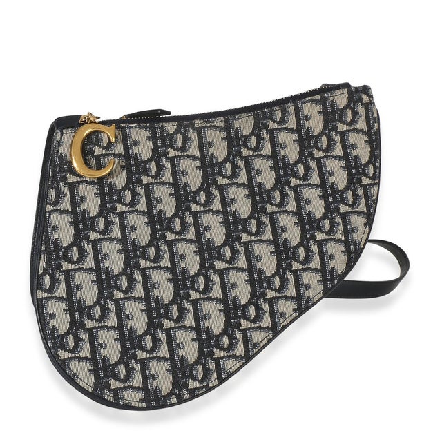 Designed by John Galliano in 1999, Dior's saddle bag made its debut on the SS00 runway. The cowboy-inspired accessory has...