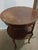 Two-tier round occasional accent table in a Louis XVI style, with brass or bronze mounts, fluted legs 20 x 28