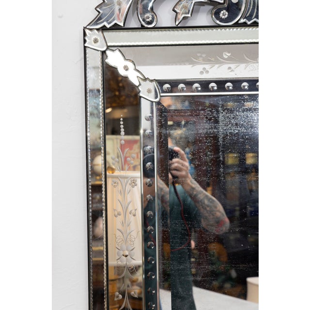 This is a classic vintage Venetian mirror with the rectangular body having the central plate surrounded by a shadow-box...