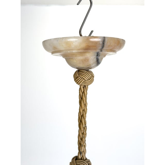 An exceptional Swedish Grace alabaster pendant lamp, dating from the 1920s–1930s, embodying the quiet sophistication and...