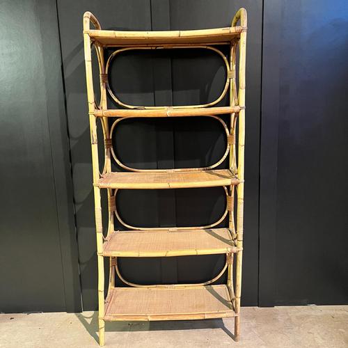 Vintage open back shelf unit with bent cane decoration There are 5 shelves and each have a bend cane detail at each end...
