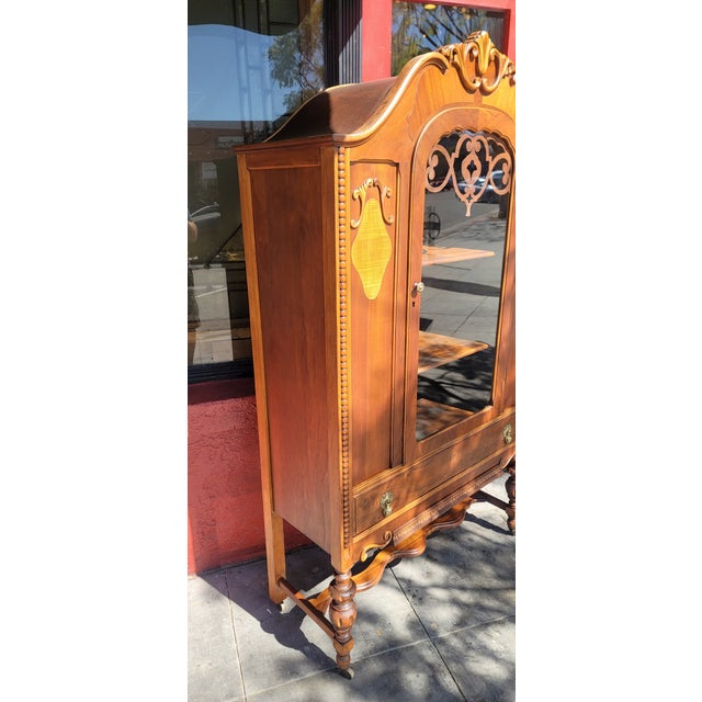 Spanish Revival walnut China Cabinet 1920s. Has two shelfs and one drawer nice dovetails. This is a clean piece has been...