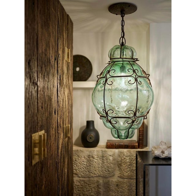 Step into the timeless allure of Italian craftsmanship with this exquisite vintage lantern. Hand-forged in Italy, this...