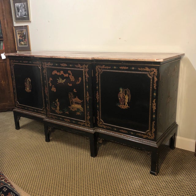 English Chinese Chippendale style marble top sideboard or cabinet. Breakfront rectangular marble top above a conforming...